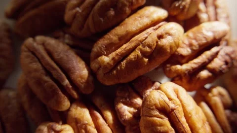 Close-up of Pecan Nuts in Warm Lighting Stock Footage 296159358