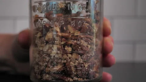 Close-up of pecans being chopped by vintage nut chopper. Stock Footage 140267582