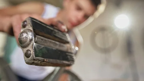 Close up on the pedal of a bicycle Stock Footage 97445878