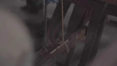 Close-up of the pedals in a loom at working Stock Footage 248799371