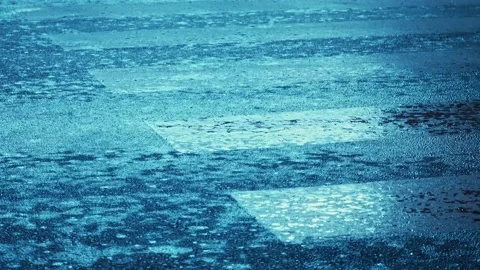 Close-up of a pedestrian zebra in the light of night lanterns and lamps. Stock Footage 226049375