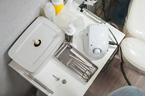 A close-up of a pedicure process with professional manicure tools Stock Photos
