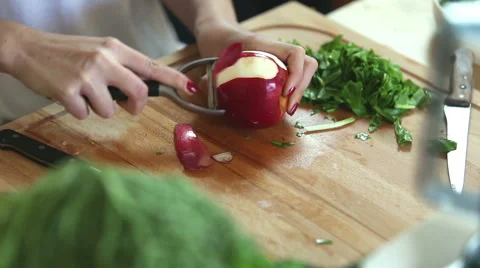 Close-up of peeling apple with peeler Stock Footage 59541559