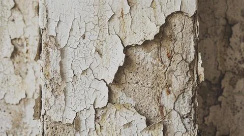 Close-up of peeling paint surface. Фото