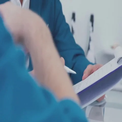 Close-up of a pen and a folder in the hands of male businessman Stock Footage 69627895
