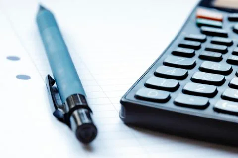 Close up of a pen on a note pad Фото