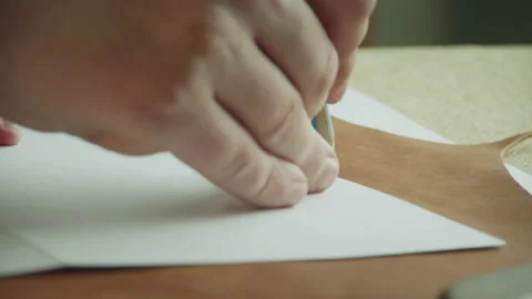 Close-up pencil outlines the pattern and marks a piece of genuine leather for 스톡 동영상 143730033