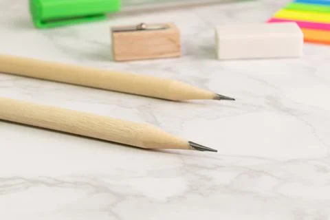 Close up a pencil on white table with school objects 스톡 사진