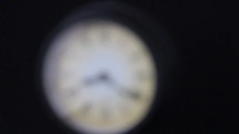 Close-up of a pendulum clock with focus shifting Stock Footage 88651138