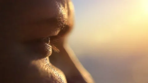 Close up of pensive handsome face young men watching sunset by the sea. Enjoying Stock Footage 47589569