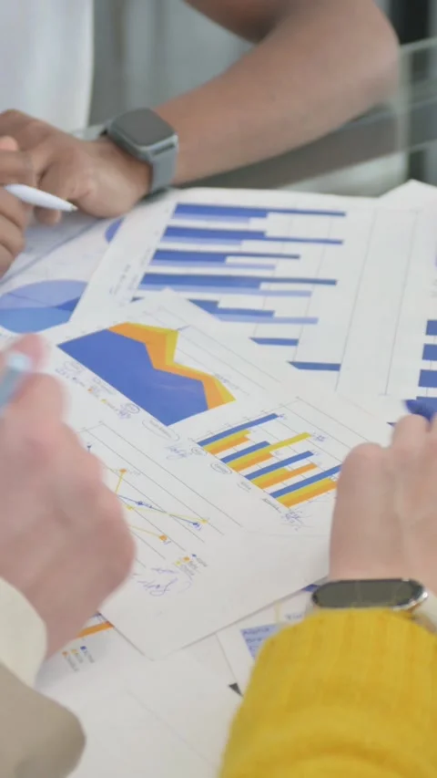 Close up of People Doing Paperwork in Office, vertical video Stock Footage 324694547