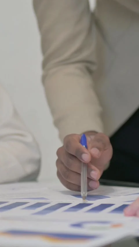 Close Up of People Doing Paperwork, vertical video Video stock 324793229