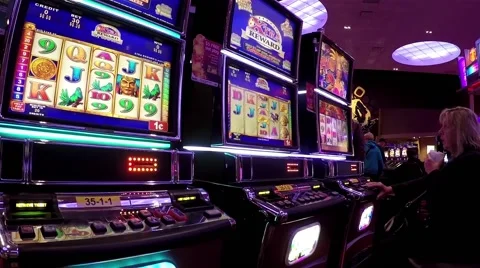 Close up people playing slot machine Stock Footage 57413710
