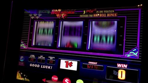 Close up people playing slot machine inside Hard Rock Casino Stock Footage 70575830