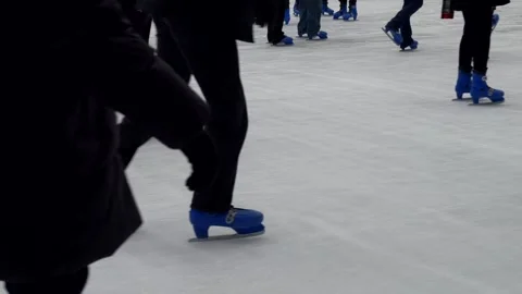 Close up people skating on ice. Slow motion 4K Stock Footage 299744652