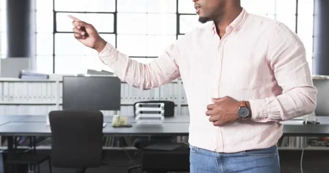 Close up of people talking to the camera, businessman in office pointing at Stock Footage 345568375