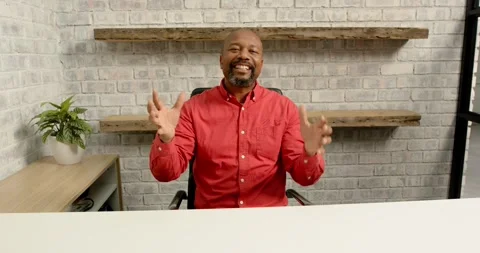 Close up of people talking to the camera, clapping hands, man sitting at desk in Stock Footage 345804003