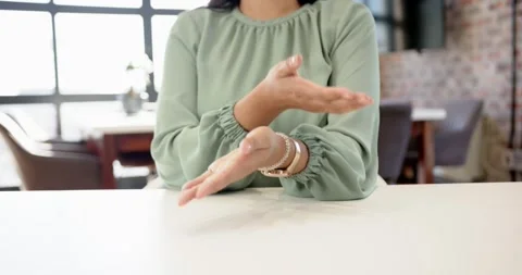 Close up of people talking to the camera, clapping hands, woman sitting at desk Stock Footage 345876644