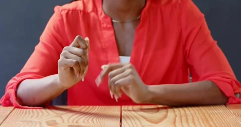 Close up of people talking to the camera, gesturing with hand, woman in red Stock Footage 345570292