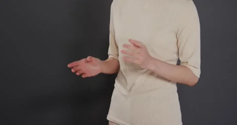 Close up of people talking to the camera, gesturing, woman in beige top giving Stock Footage 345570576