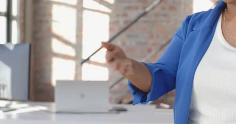 Close-up of people talking to the camera, hand gesturing in modern office with Stock Footage 345567609