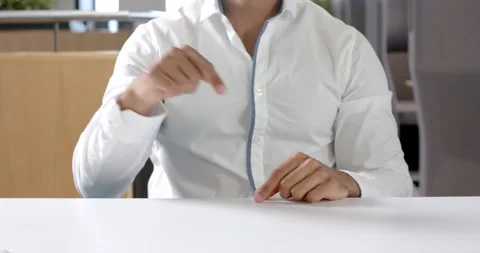 Close up of people talking to the camera, pointing at table, man in white shirt Stock Footage 346217788