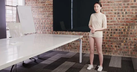 Close up of people talking to the camera, presenting in room, woman standing Stock Footage 346295689