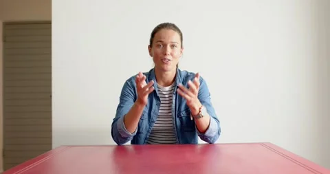 Close up of people talking to the camera, talking and gesturing, woman sitting Stock Footage 345713065