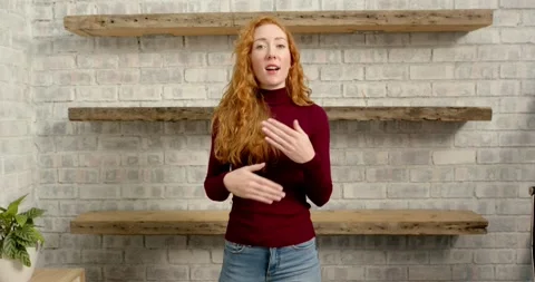 Close up of people talking to the camera, woman in casual outfit, gesturing with Stock Footage 346284834