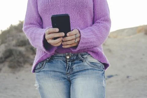 Close up of people using smart phone in outdoor. Technology and communication Stock Photos