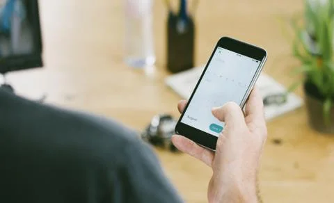 Close up of people using a smartphone with touch display Stock Photos