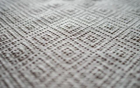 Close up of perforated kitchen paper with diamond pattern Stock Photos