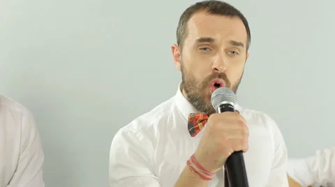Close-up of performance of singer as part of of the musical group in the studio Video stock 49841601