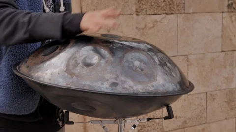 Close up of a performer playing hang drummer on the street in Israel. Stock Footage 125932206