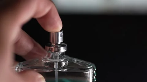 Close up of perfume bottle in hands Stock Footage 316580334