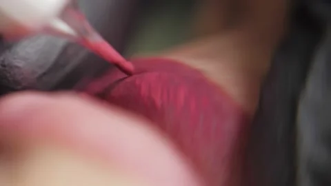 Close-up of a permanent makeup procedure. Macro Stock Footage 200823279