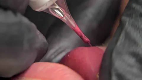 Close-up of a permanent makeup procedure. Macro Stock Footage 200823463