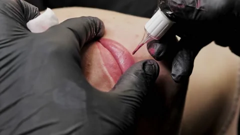 Close-up of a permanent makeup procedure. Macro Stock Footage 200824258