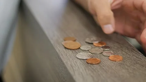 Close Up Person Hand Counting Small Money Coins on Wooden Table Surface Fin.. Vídeo Stock 347171550
