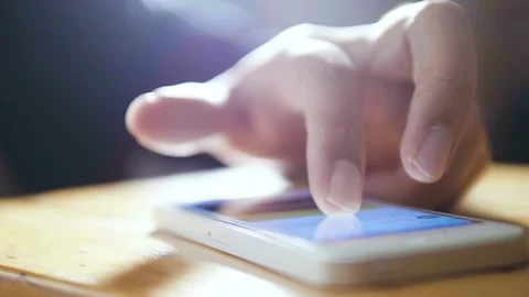 Close-up of person hands using smartphone or cell phone Tapping scrolling w.. Stock Footage 272779326