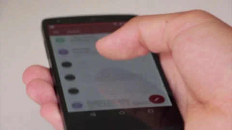 Close-up of person hands using smartphone or cell phone Tapping scrolling e.. Stock Footage 272779363