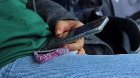 Close up of person hands using smartphone while sitting in public transport Stock-Footage 328230796