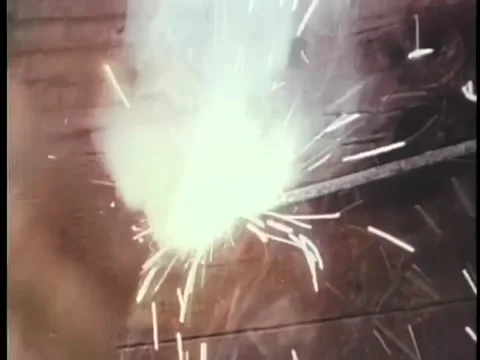 Close-up of person lighting stick of dynamite Stock Footage 260254672