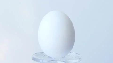 Close-up of a person painting Easter eggs with a special brush Stock Footage 172196054