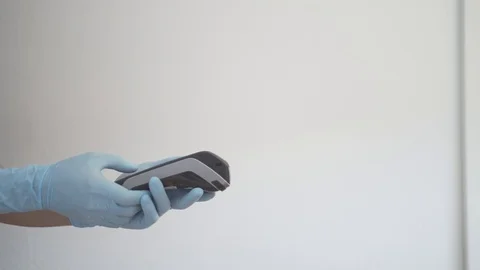 Close Up of Person Paying By Card Using Gloves. Lifestyle Concept. Stock Footage 129572945