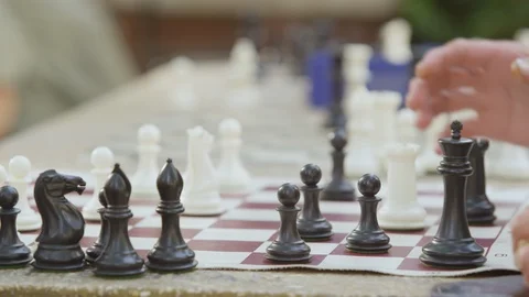 Close-up of person playing chess Stock Footage 103429155