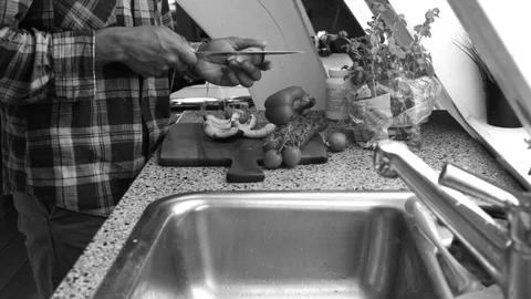 Close up person preparing vegetables to bake at home- 15s Stock Footage 128931485