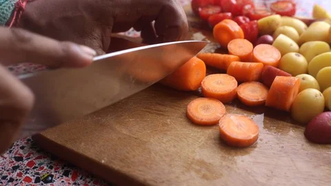 Close up of person preparing veggies to bake at home - 15s Stock Footage 128661570