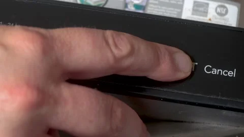 Close-up of a person pressing the start button on a new dishwasher Vídeos de archivo 313908110
