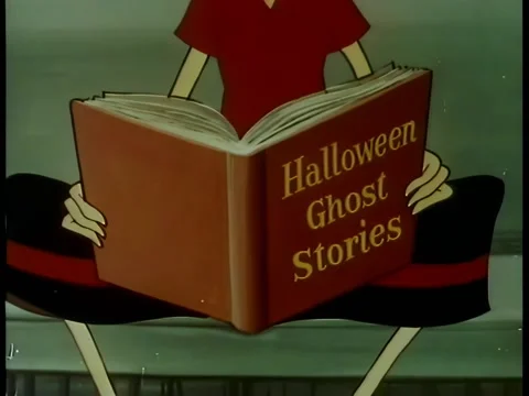 Close-up person reading halloween ghost stories Stock Footage 261022368